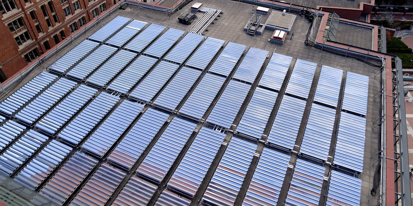Large-scale solar thermal collector array installed on a major London institution's rooftop